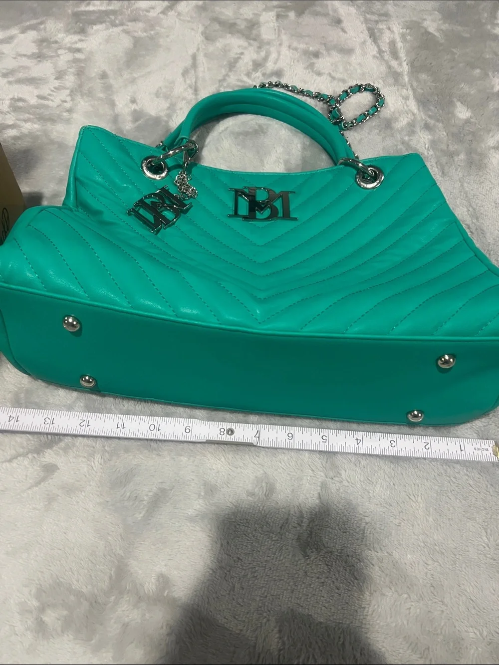 Badgley Mischka Chevron Quilted Shoulder Bag in a vibrant teal/mint green hue.